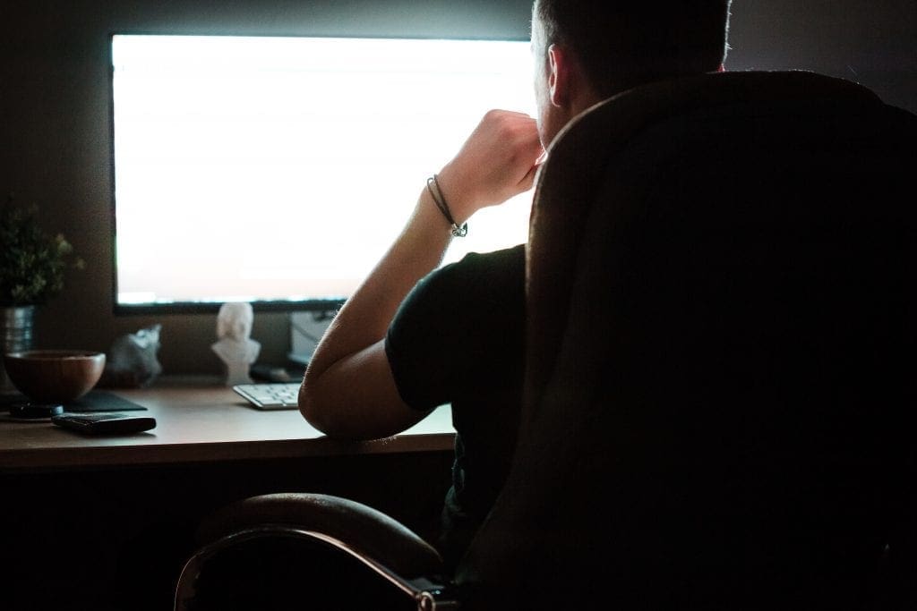 Night Owl Man Working On Computer At Night
